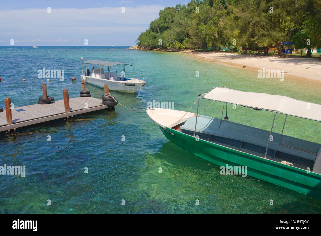 Wassertaxis am Steg auf Pulau Manukan im Tunku Abdul Rahman Nationalpark nr Kota Kinabalu Sabah Malaysia Stockfoto