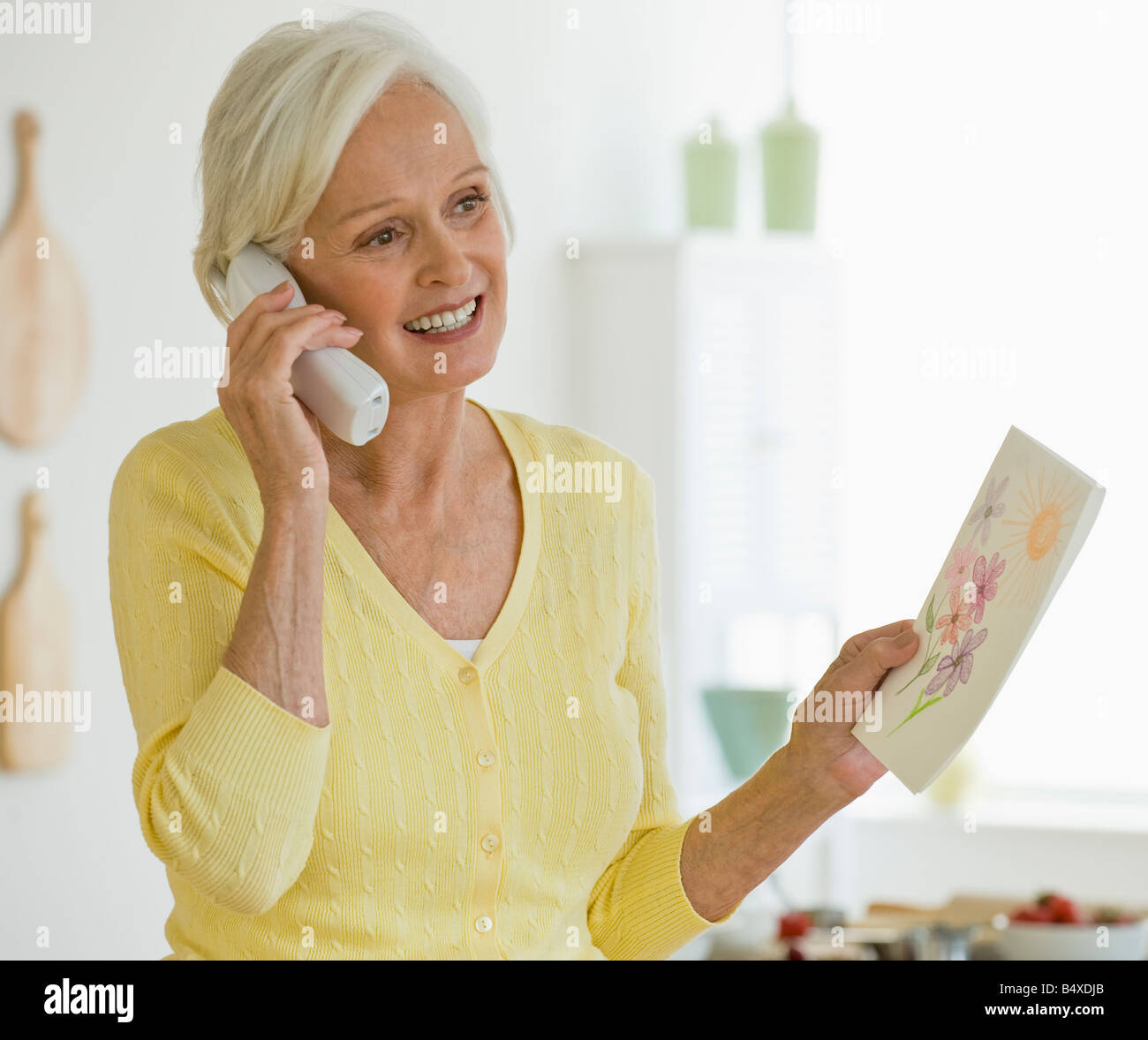 Frau am Telefon Stockfoto
