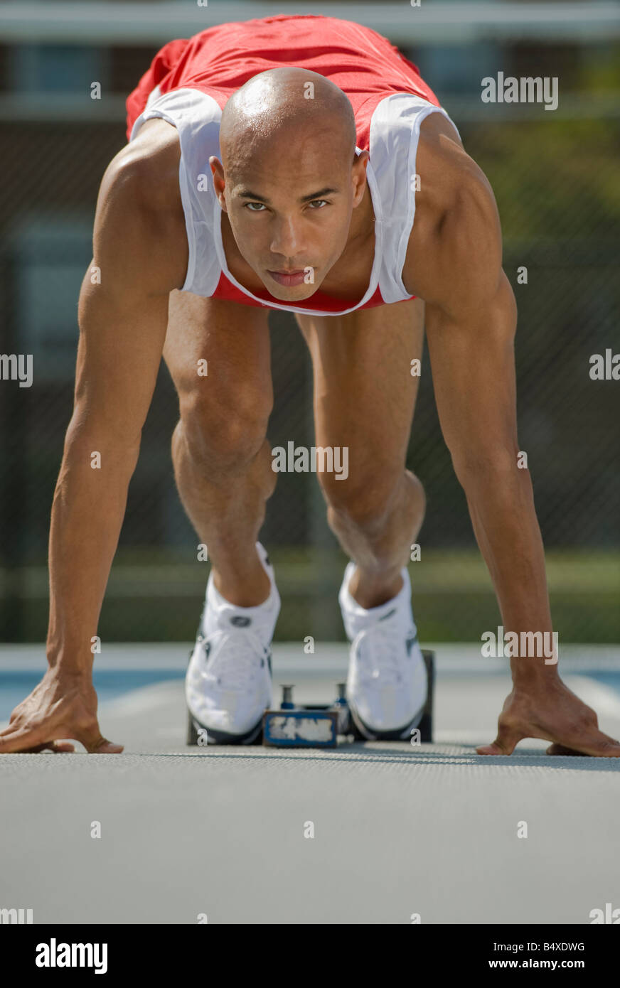 Läufer auf Starter block Stockfoto