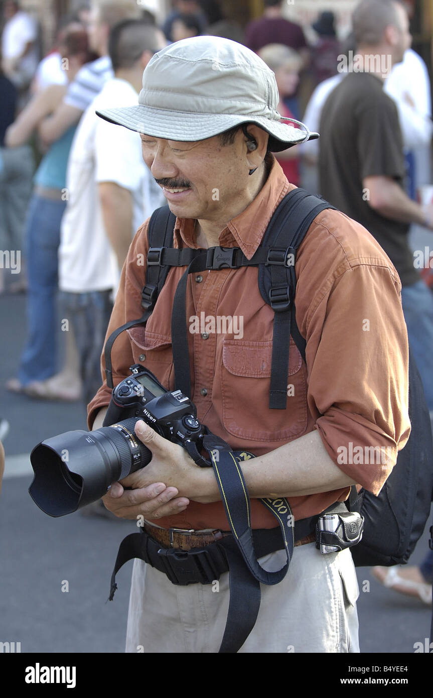 Asiatischen männlichen Fotografen. Stockfoto