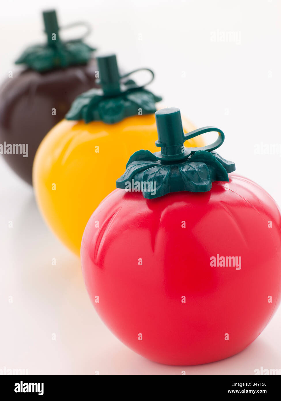 Drei Tomaten Sauce Flaschen geformt Stockfoto