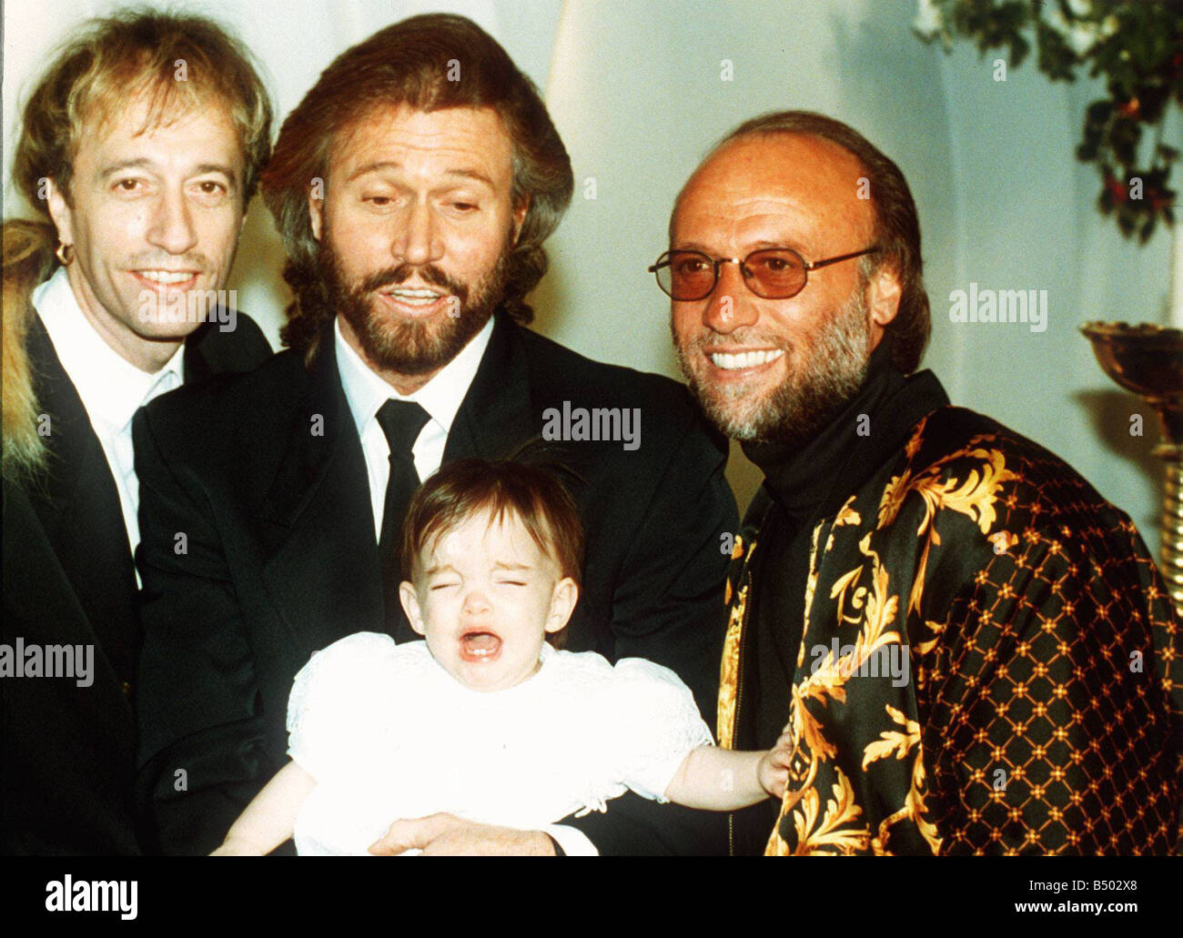 Biene Gees Popgruppe Maurice Gibb Robin Gibb und Barry Gibb mit seiner Tochter Alexandra Stockfoto