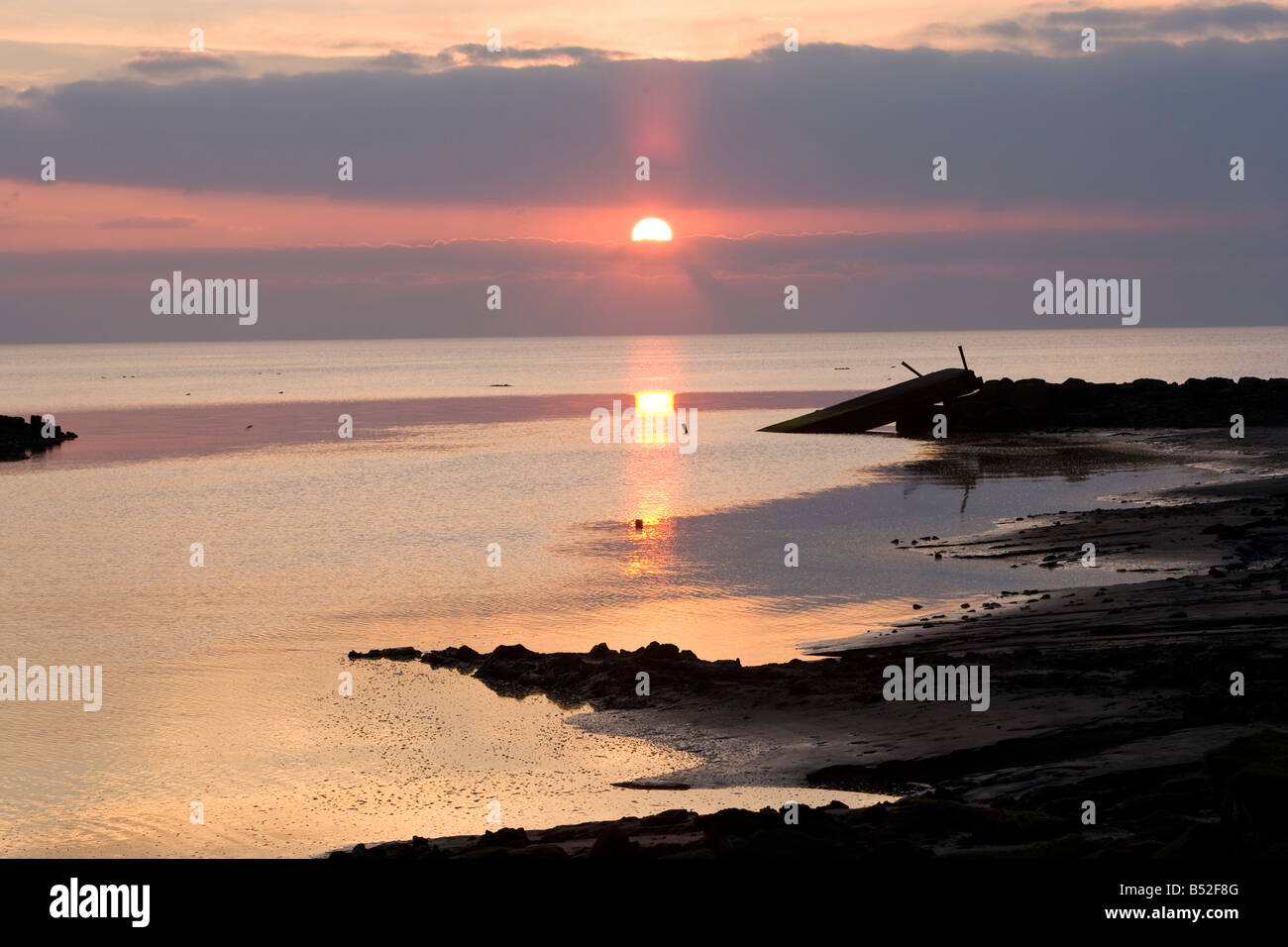 Sonnenuntergang über der Mündung in Silverdale, Lancashire. Wattenmeer. Stockfoto