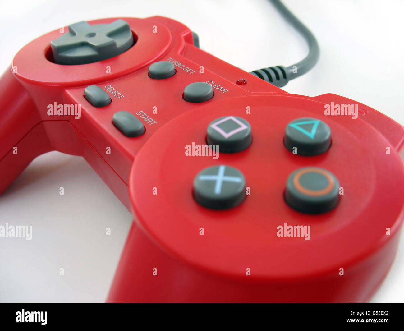 eine rote Videospiel-Controller über weißen isoliert Stockfoto