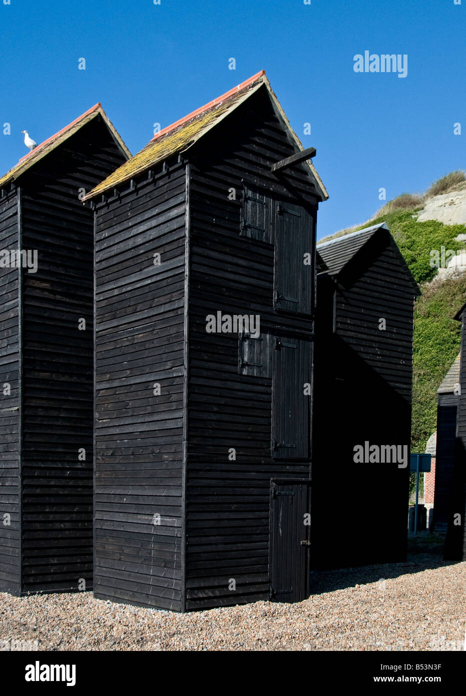 Die Net Geschäfte auf dem Stade in Hastings in Sussex. Stockfoto