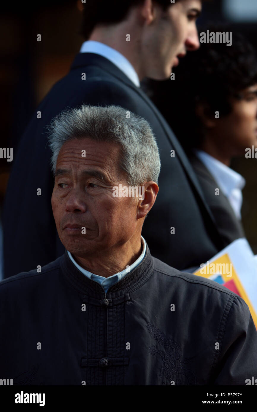 Ein chinesischer Demonstrant im Stadtzentrum von Cambridge. Stockfoto