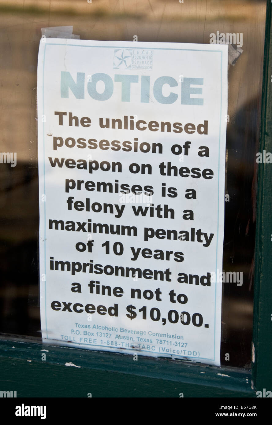 Texas Hill Country Comfort National Historic District Waffen Gesetz Bekanntmachung im bar-Fenster Stockfoto