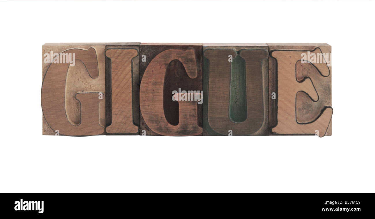 das Wort "Gigue" in alten, blau gefärbten Holzart Stockfoto