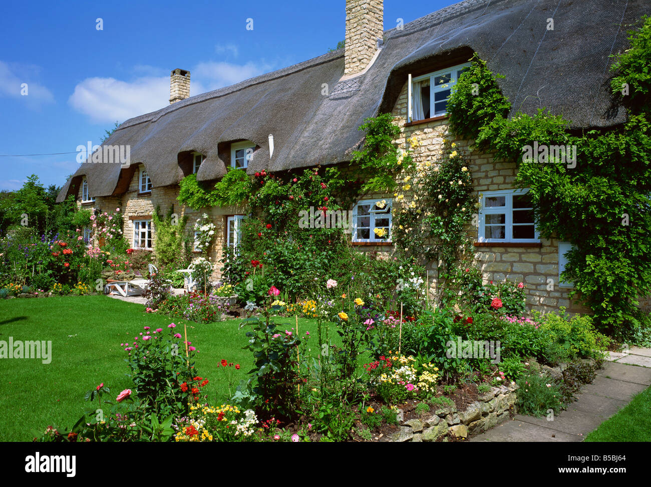 Reetdachhaus, Cotswolds, Gloucestershire, England, Europa Stockfoto