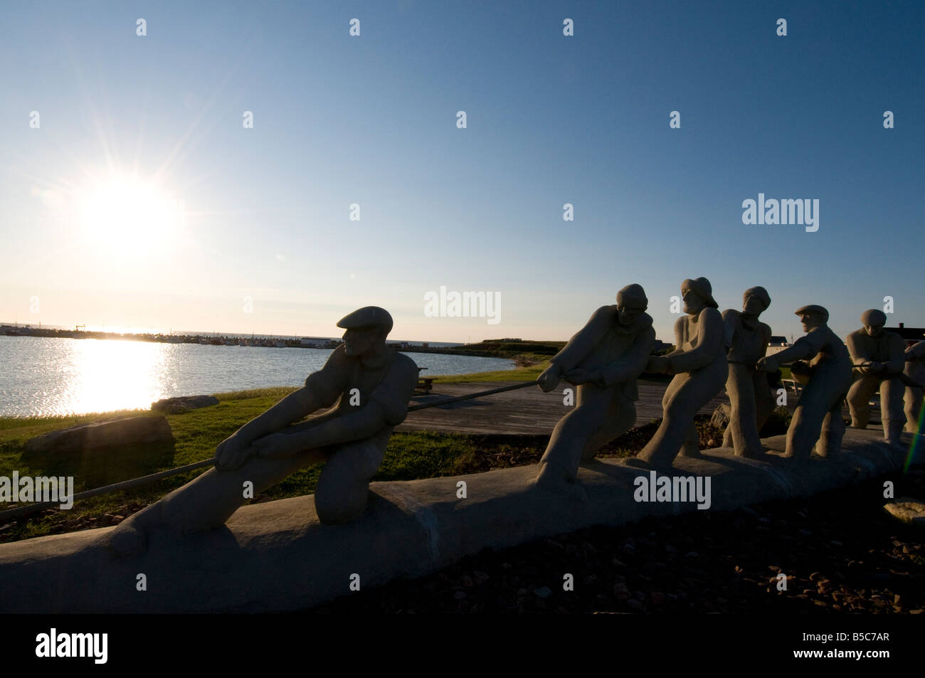 Îles De La Madeleine Quebec Port des Etang du Nord berühmte Fischer-Statue des Bildhauers Langevin Stockfoto