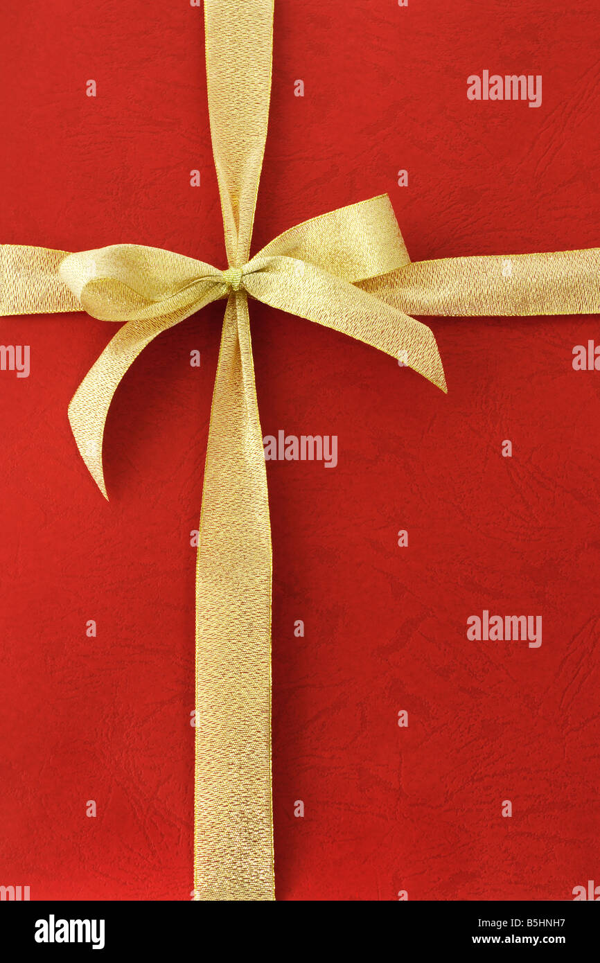 Gold Bug Farbband auf rotem Grund Stockfoto