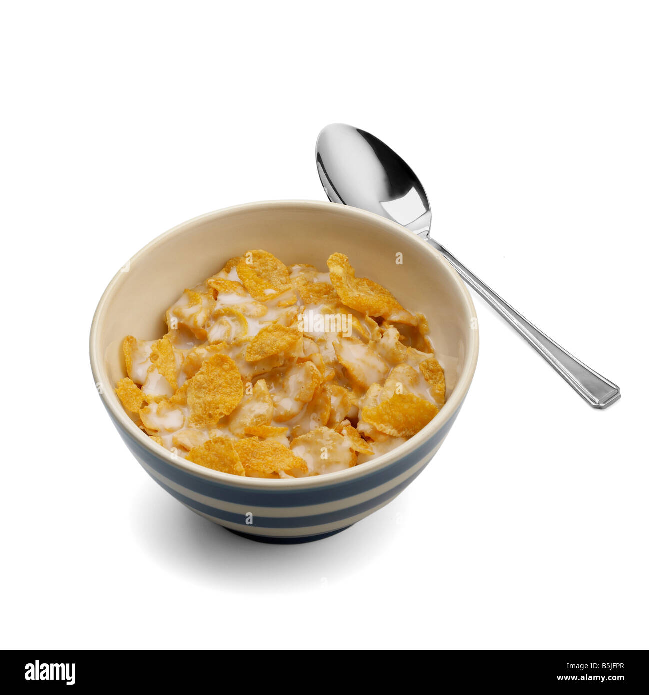 Schüssel Cornflakes mit Löffel Stockfoto