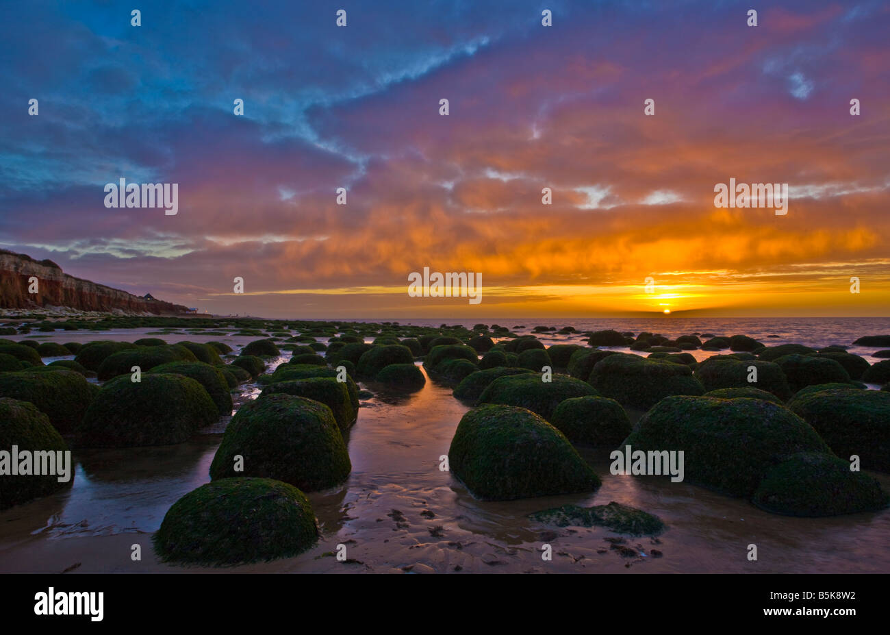 Hunstanton Strand bei Sonnenuntergang Stockfoto