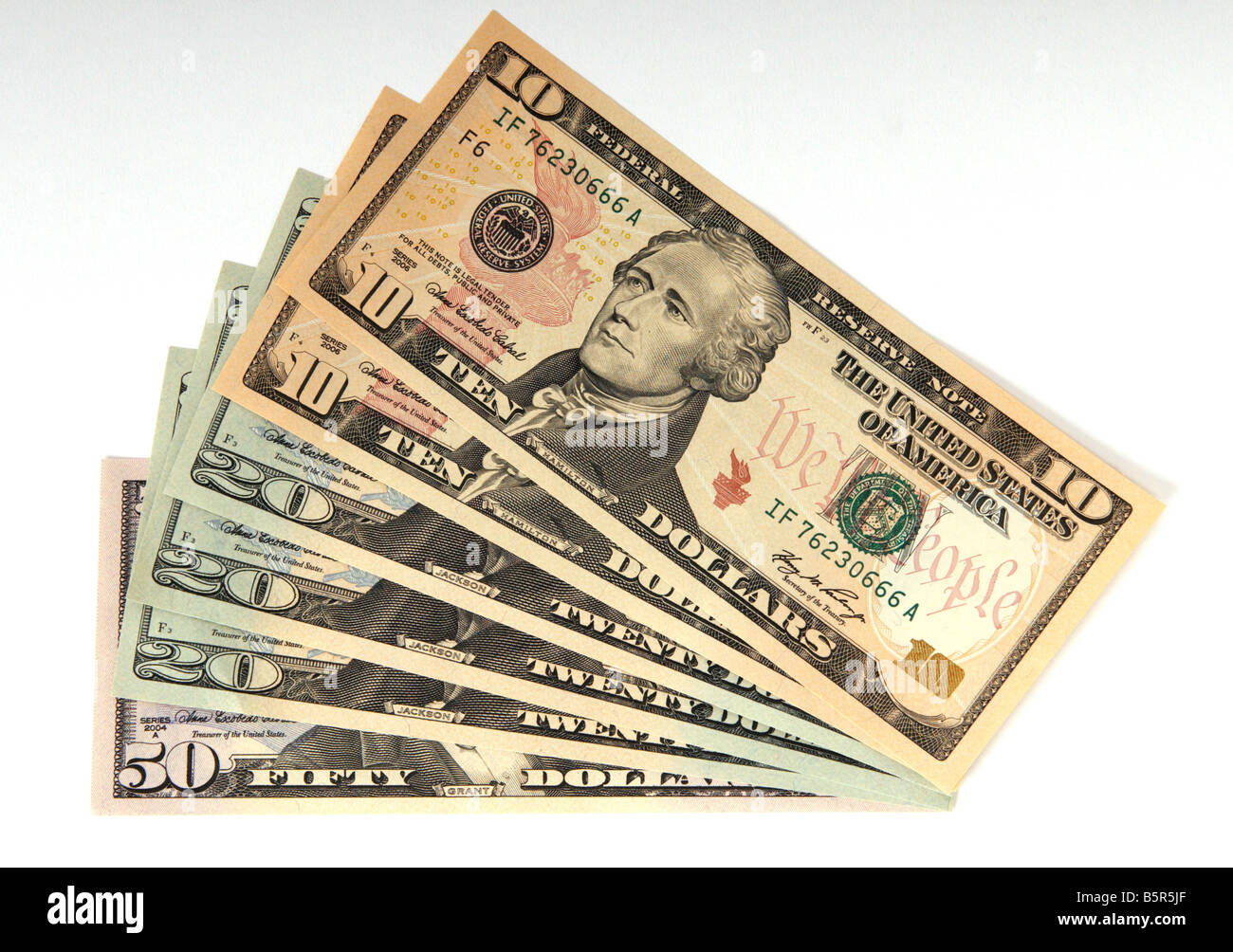 Haufen von amerikanischen Dollar-Banknoten Stockfoto