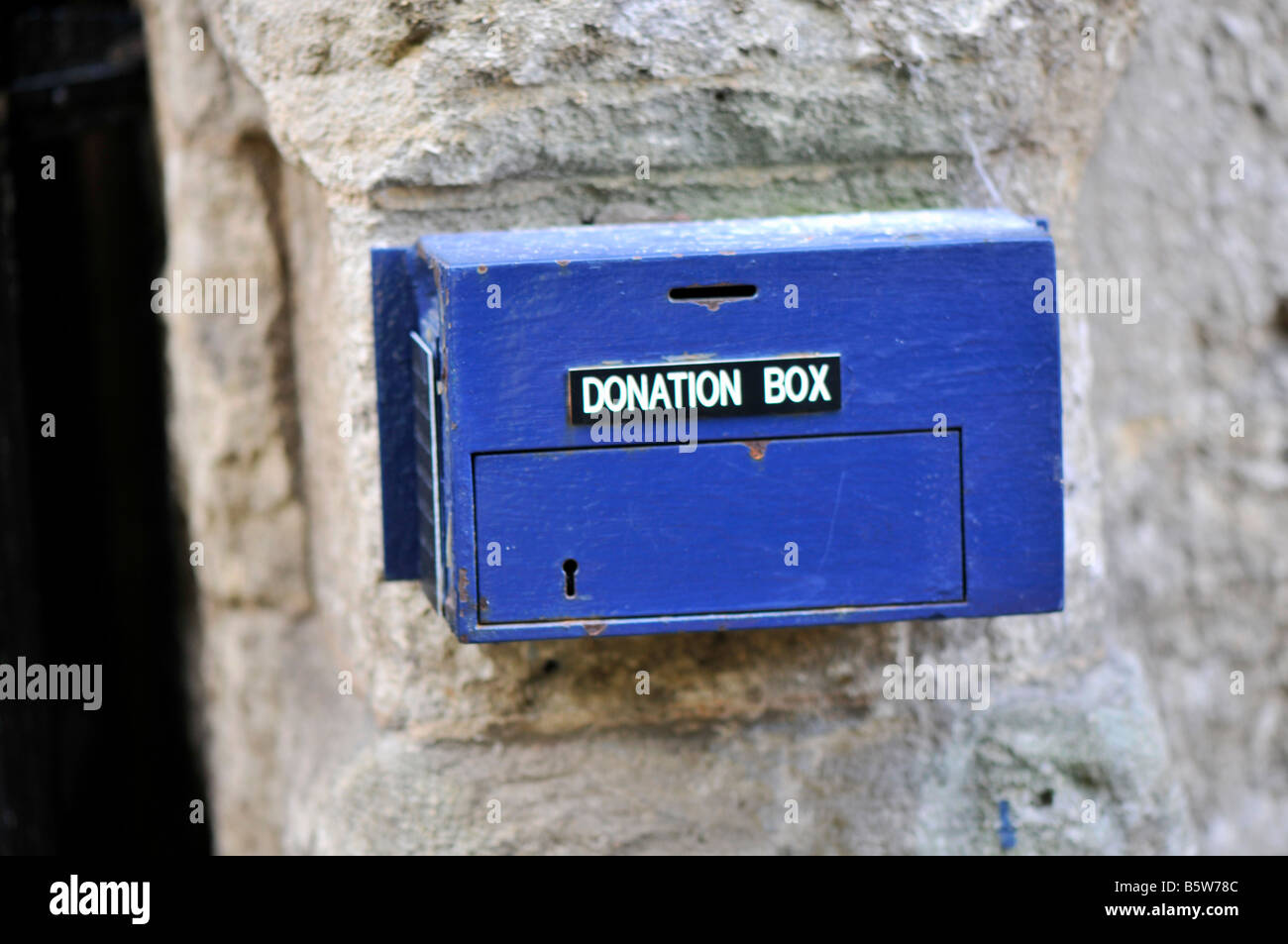 Blaue Spendenbox Stockfoto