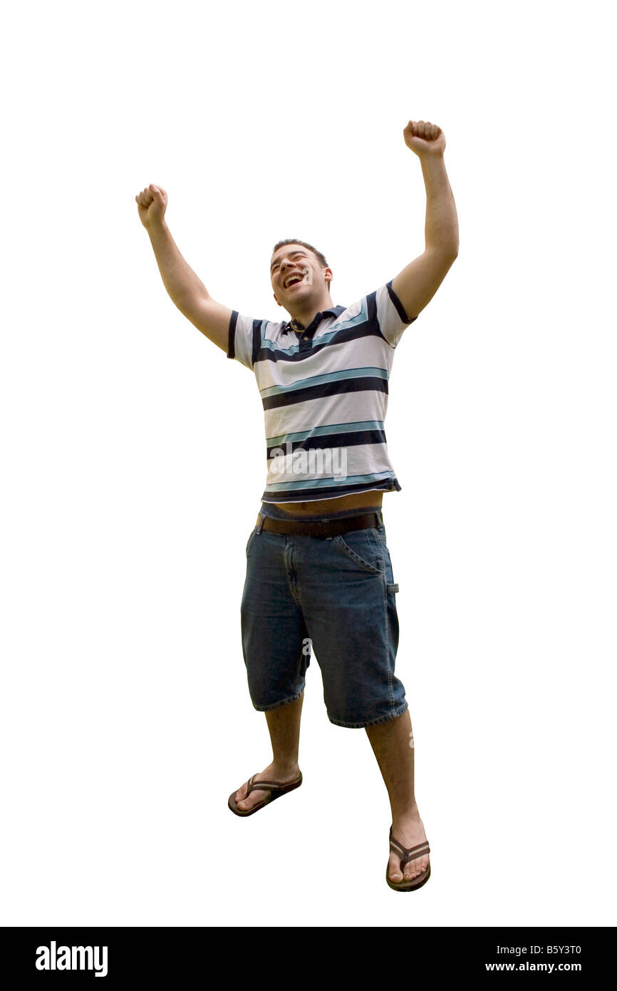 Ein junger Mann freudig wirft seine Hände in die Luft enthält die Clipping-Pfad Stockfoto