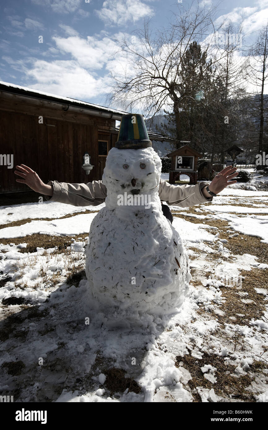 Schneemann mit Armen Stockfoto