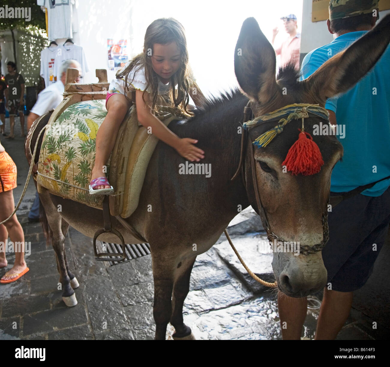 Kinder und Esel Lindos Rhodos griechische Inseln Griechenland Hellas Stockfoto