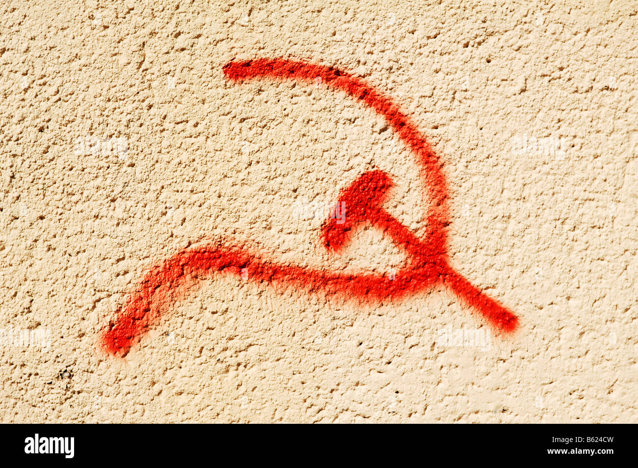 Graffiti hammer and sickle Fotos und Bildmaterial in hoher Auflösung