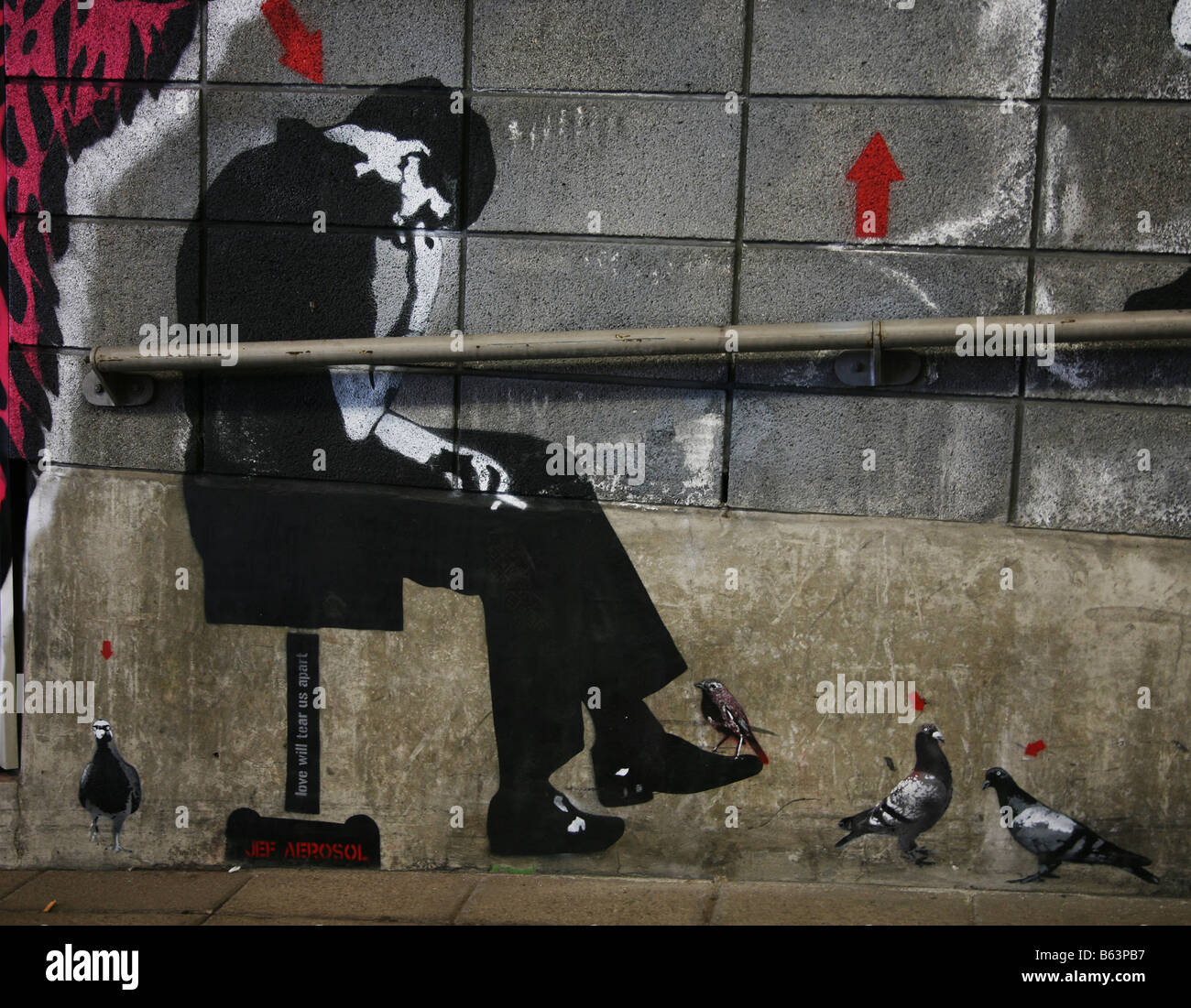 deprimiert, traurig Obdachlose Banksy Graffiti-Künstler-Kunst Stockfoto