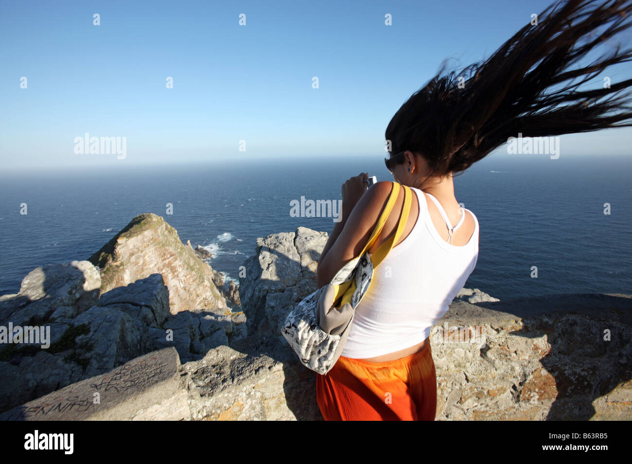 Mädchen Haare Schlag durch starke Winde Cape Point Cape Town Südafrika März 2008 Stockfoto