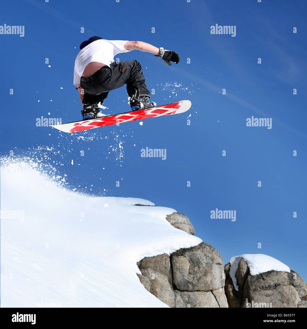 Snowboarder springen Stockfoto