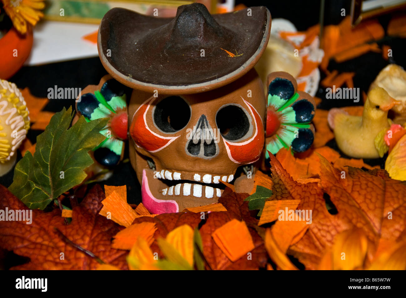 Schädel, lächelnd mit schwarzen Hut Tag der Toten mexikanische Tradition Dia de Los Muertos Feier San Antonio, Texas Stockfoto