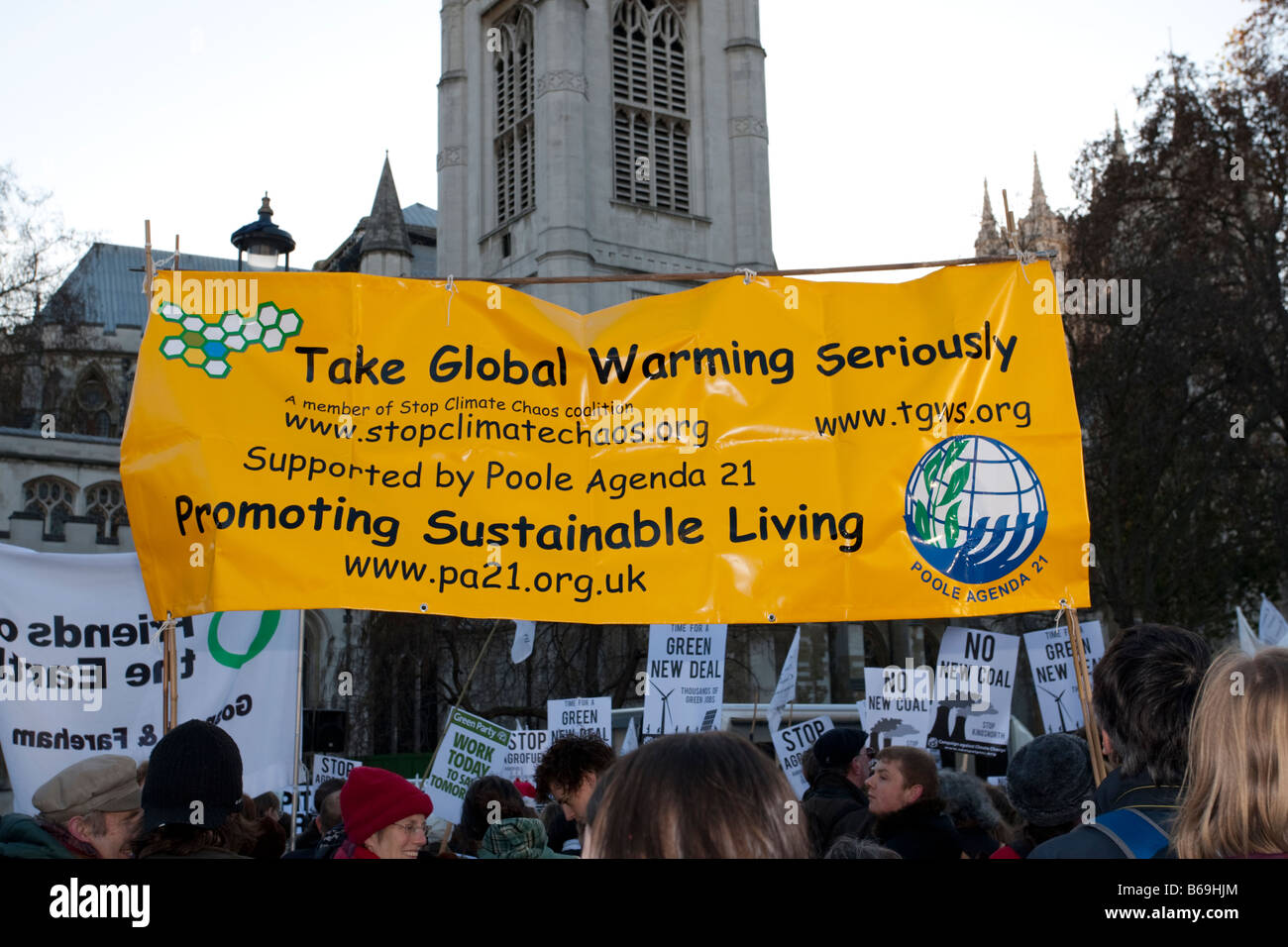 Aktivisten mit nehmen globale Erwärmung ernst banner auf Klima-Änderung-März-London Dezember 2008 UK Stockfoto