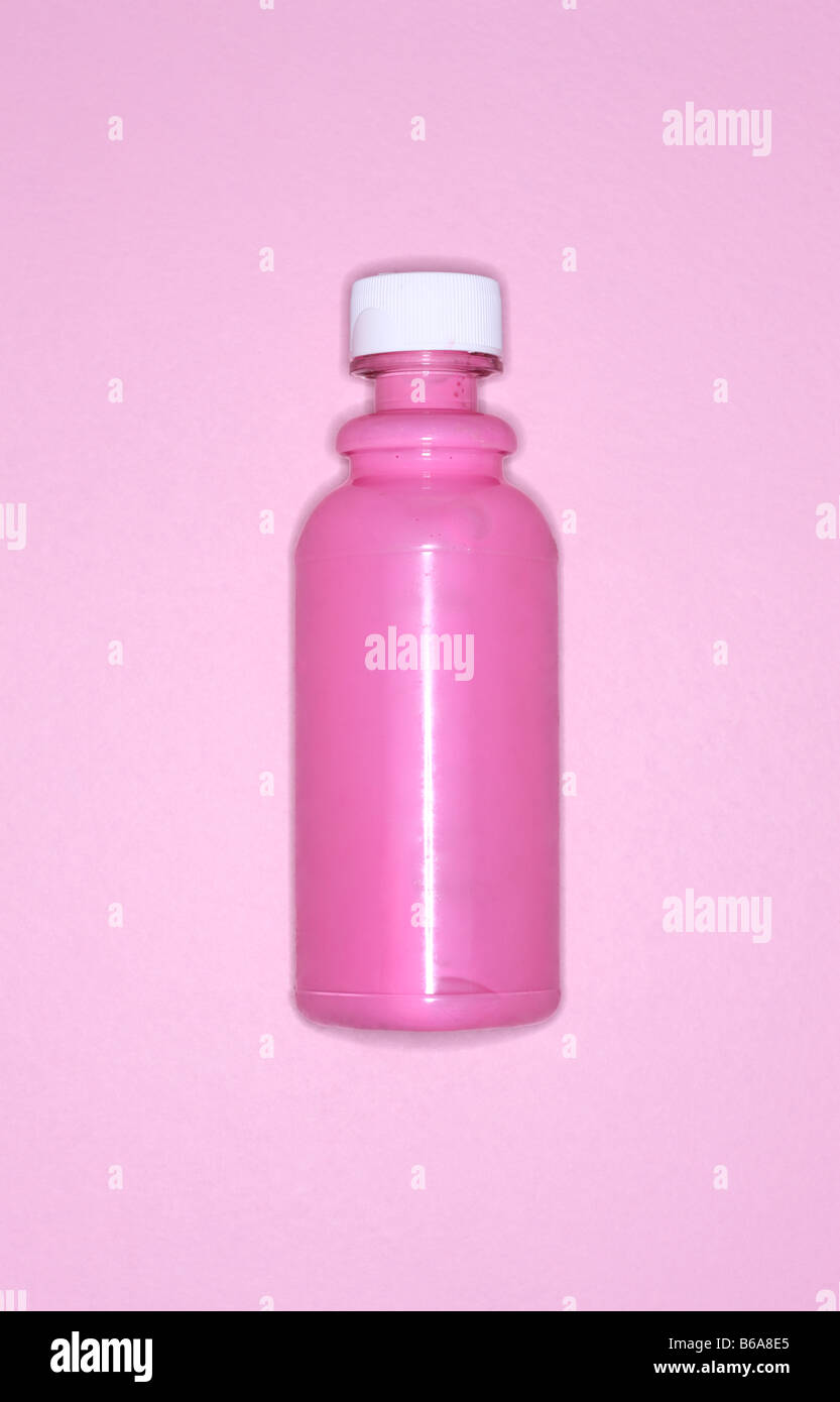 Flasche rosa Medizin auf rosa Hintergrund Stockfoto