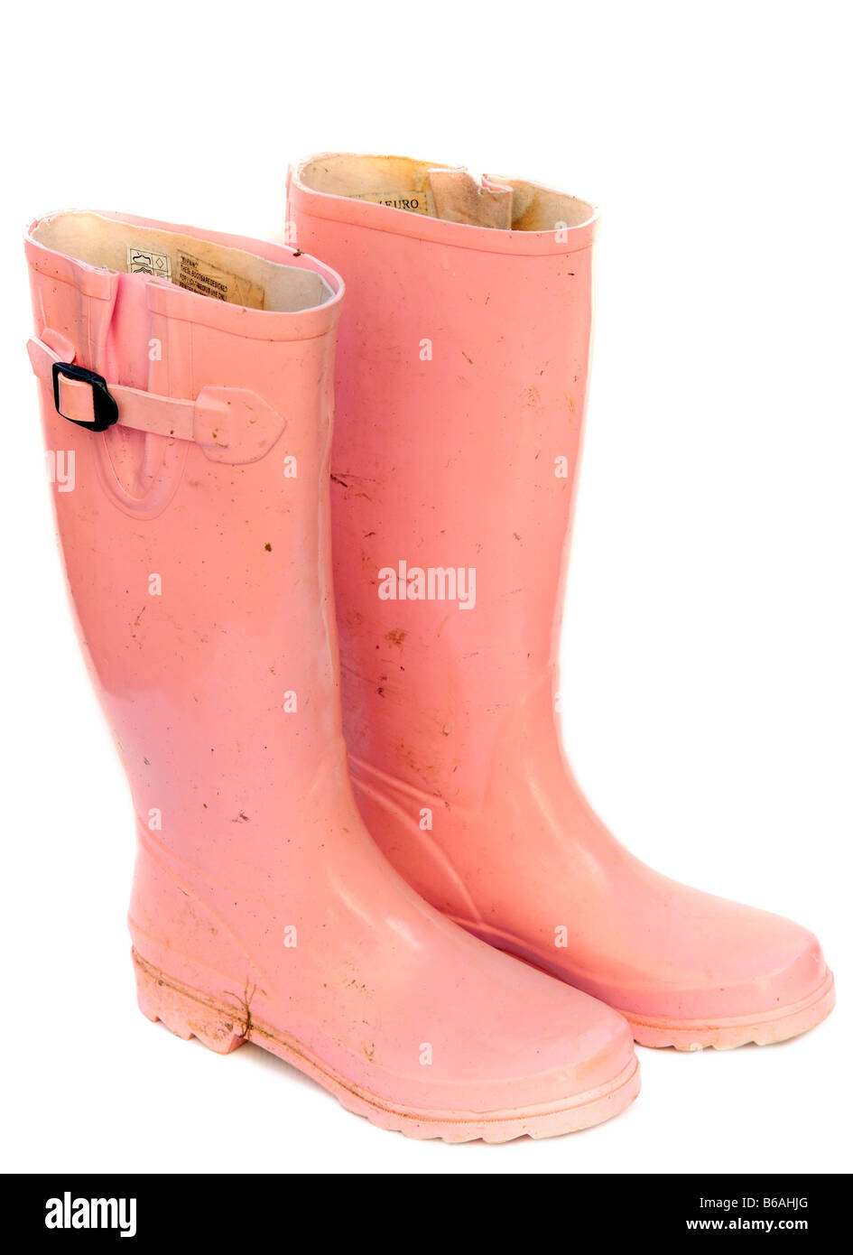 Rosa Gummistiefel. Stockfoto