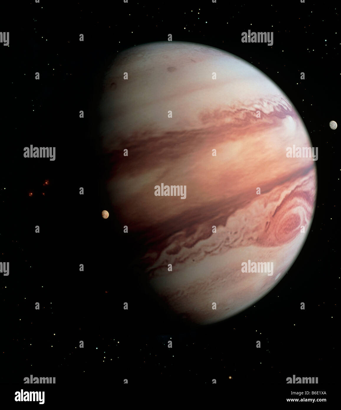 Gas riesigen Planeten Jupiter und zwei seiner Monde Stockfoto