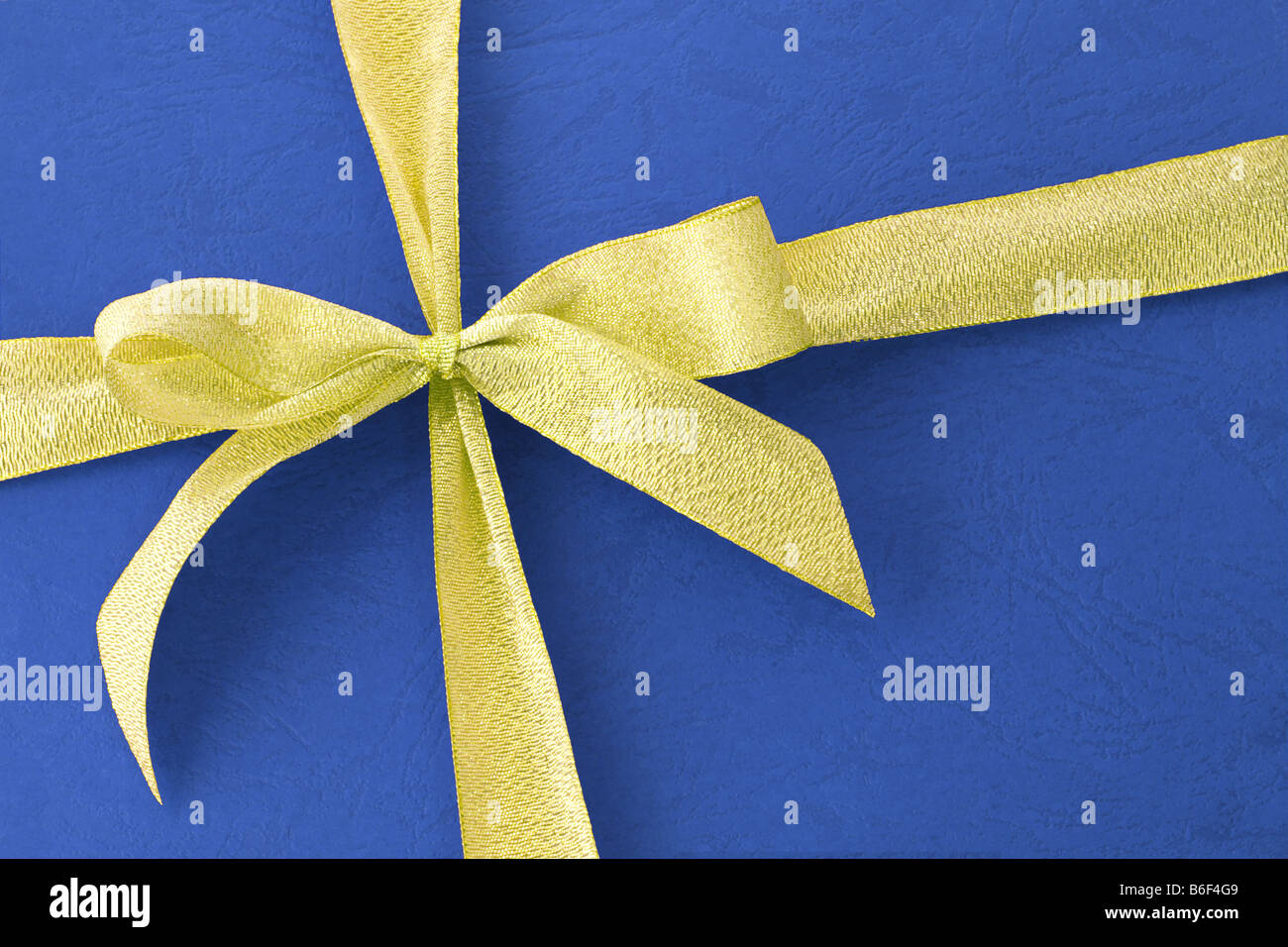 Gold Bug Farbband auf blauem Hintergrund Stockfoto