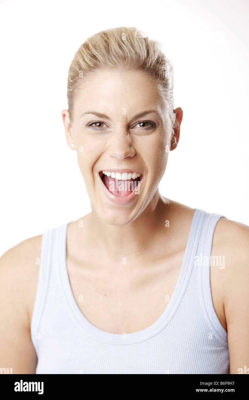 Blonde Frau trägt eine Top, lachen Stockfoto