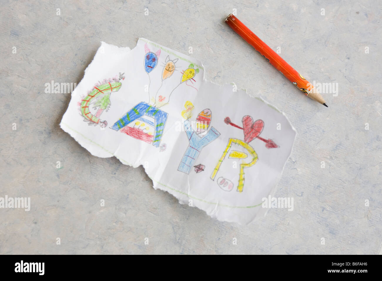 ein Bleistift und ein Kinder-Wort-Bild Stockfoto