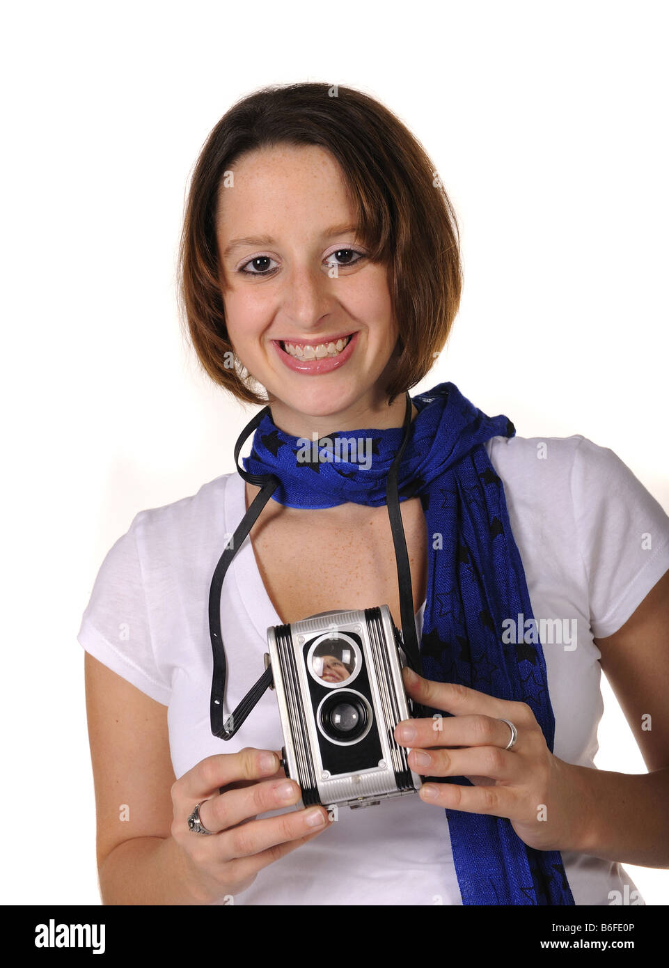Teengirl mit Vintage-Kamera. Stockfoto