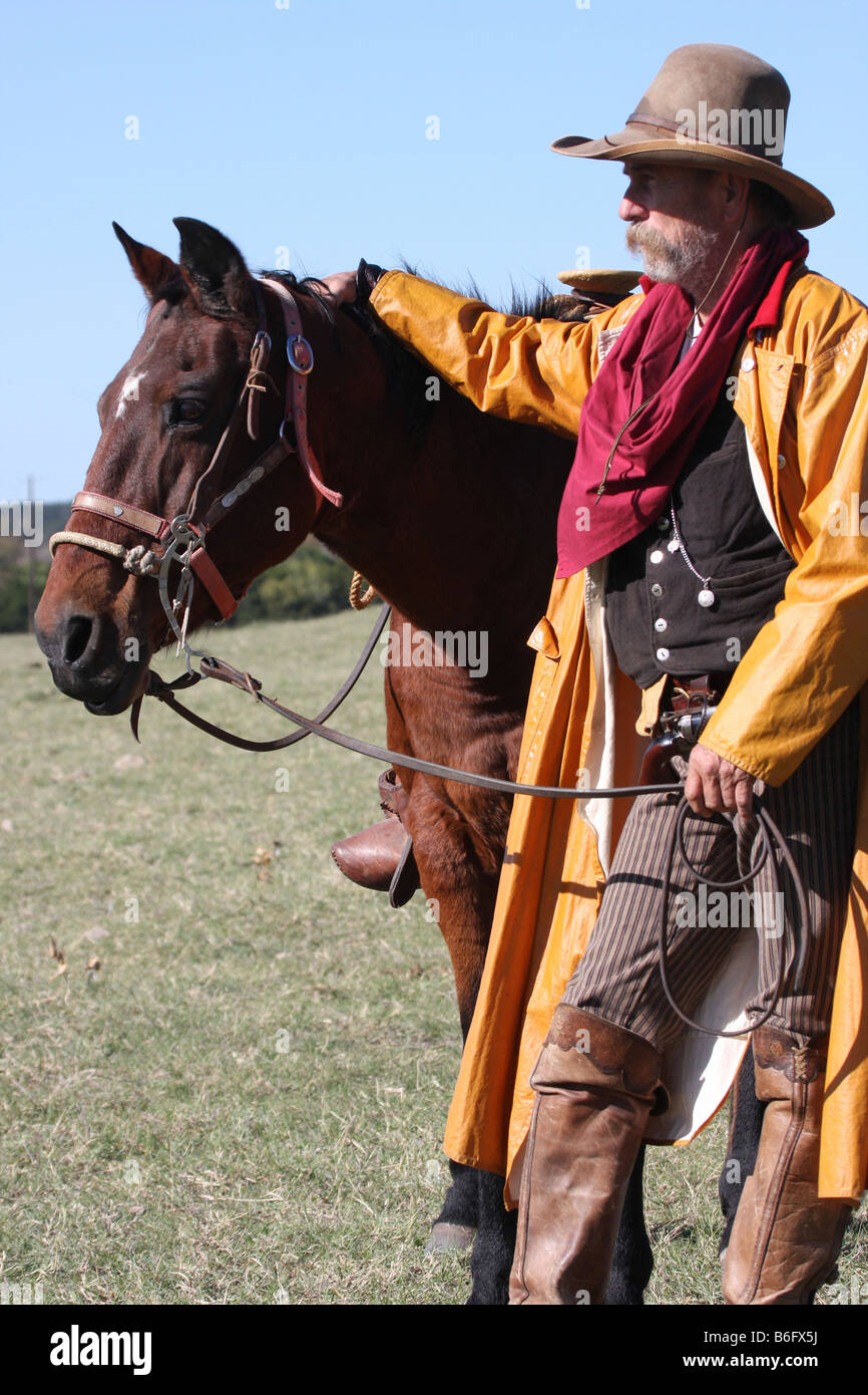 Es gibt eine Verbindung zwischen ein Cowboy und sein Pferd, auf der range Stockfoto