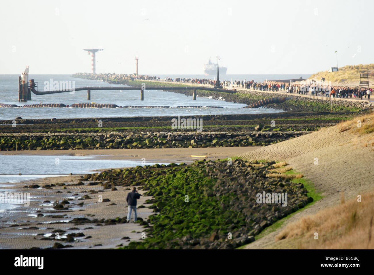 Damm Damm Sand Felsstrand bei Hoek Van Holland Meer Eingang Europoort Port Hafen Niederlande Stockfoto