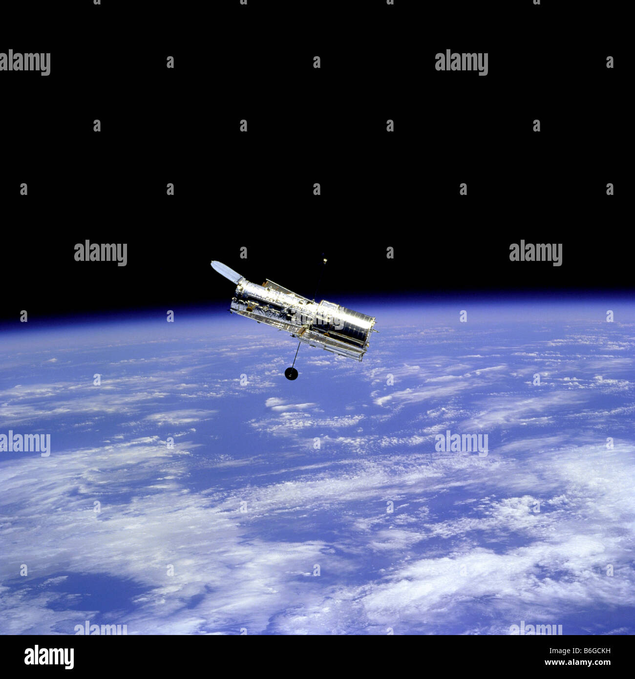 Hubble-Weltraumteleskop und Erde Stockfoto