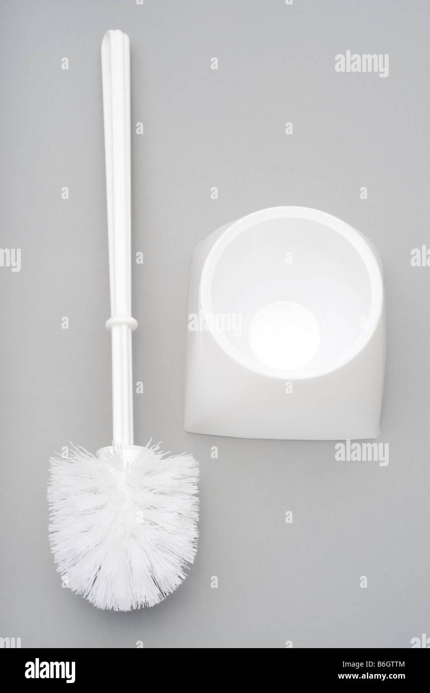 Weiße Kunststoff WC-Bürste und Halter Stockfoto