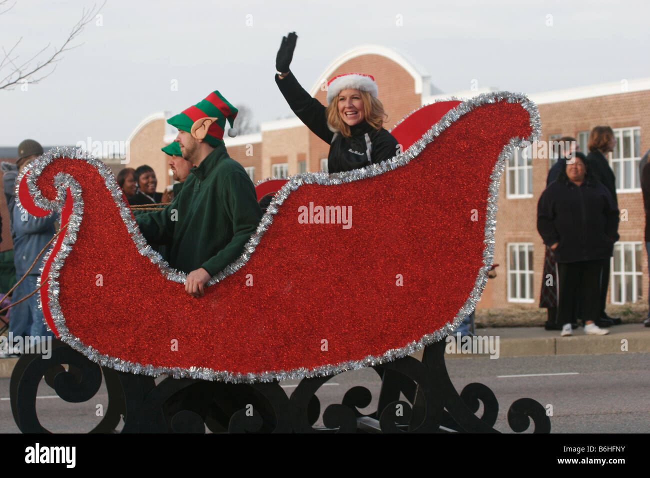 Schweben Sie im Christmas Parade mit Elfen Stockfoto