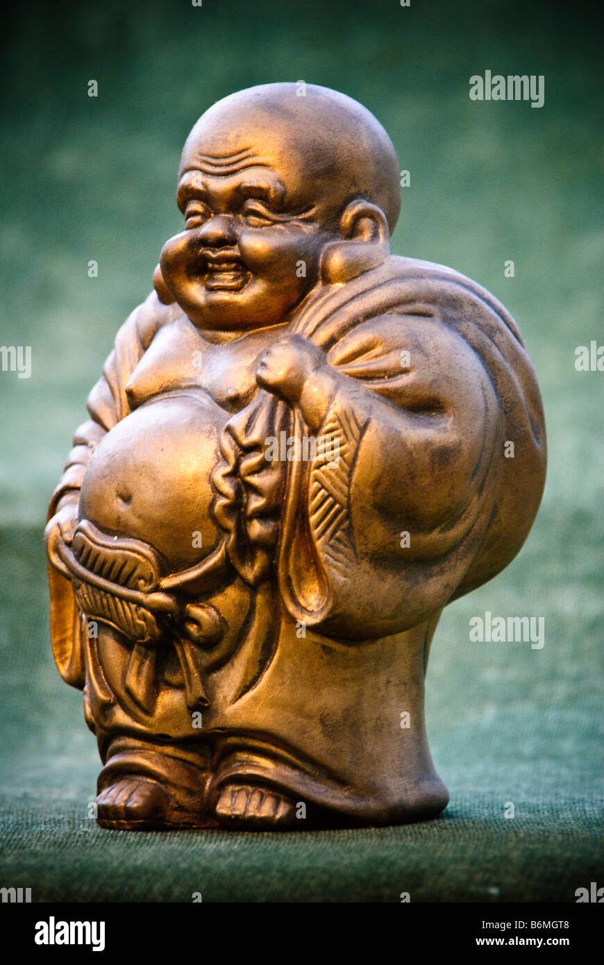 Kleine lächelnde Buddha Stockfoto