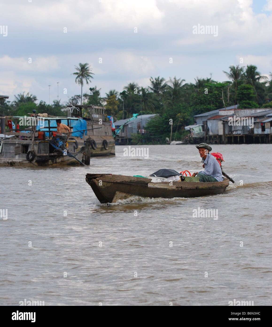 Mann im Sampan, Cai Be, Mekong-Delta Stockfoto