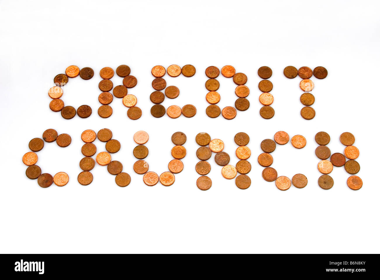 Konzept der Worte "Kreditklemme" in ein paar Cent auf weißem Hintergrund als Symbol für magere Zeiten dargelegt Stockfoto