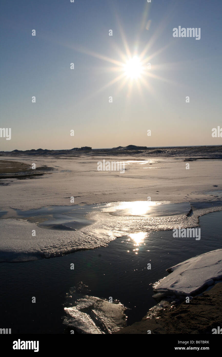 Sonnenuntergang über Eisformationen im Lake Michigan Stockfoto