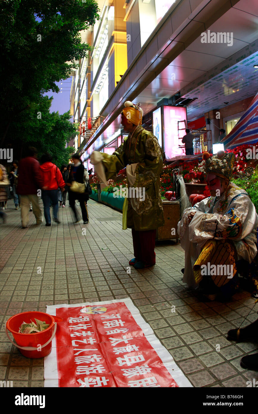 elegante chinesische Bettler Durring globale Krise Stockfoto