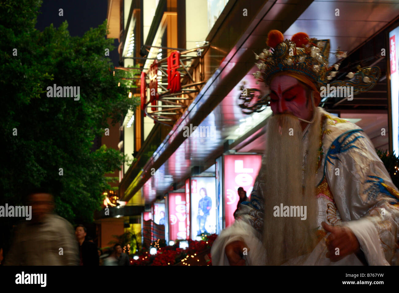 elegante chinesische Bettler Durring globale Krise Stockfoto