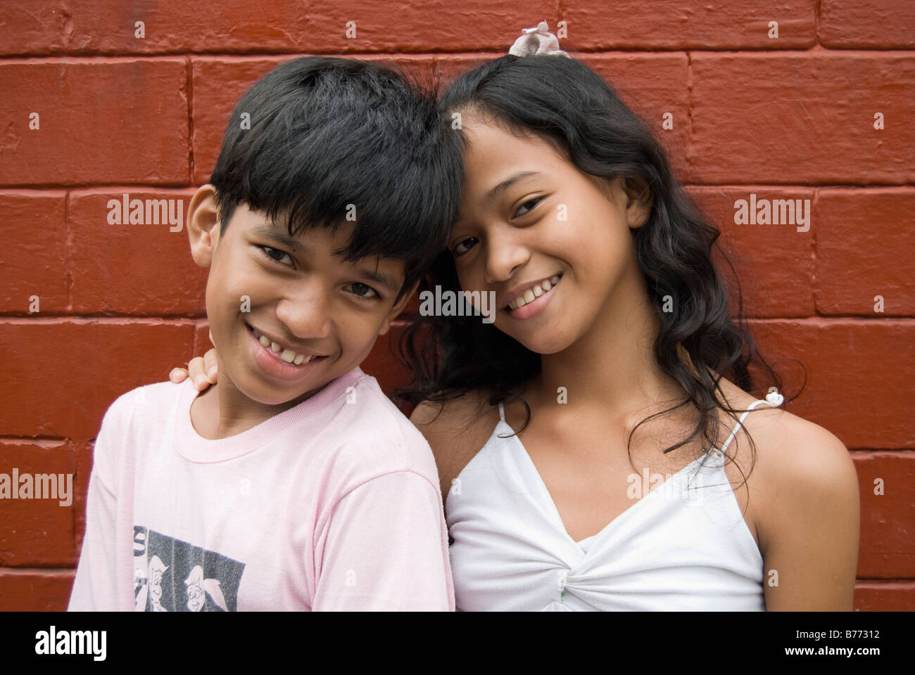 Junge Junge und Mädchen lächelnd, Intramuros, Manila, Philippinen Stockfoto
