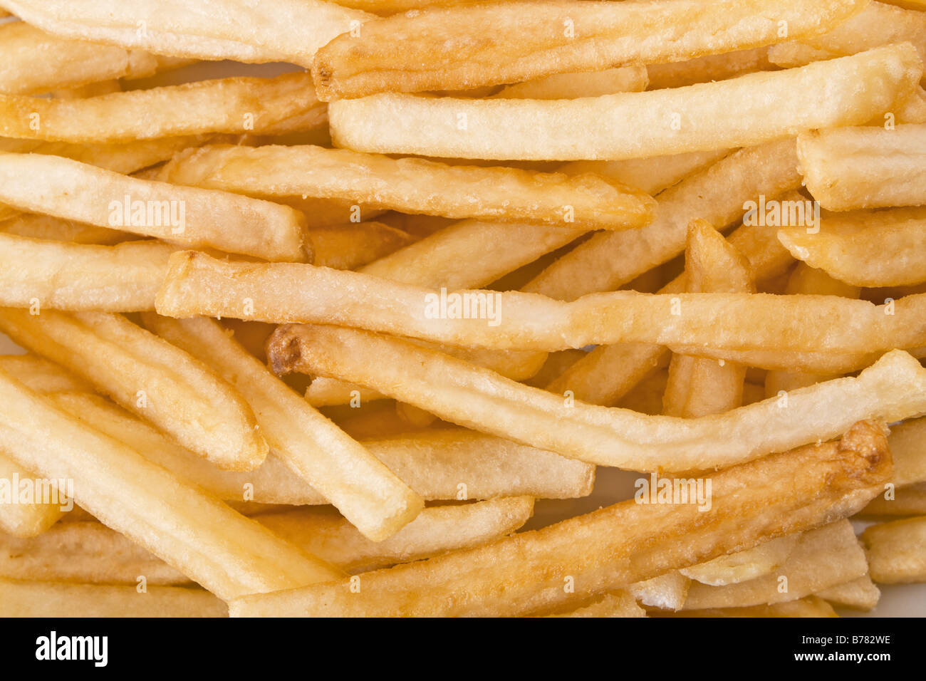 Hintergrund, die mit Kartoffelchips oder Pommes frites Stockfoto