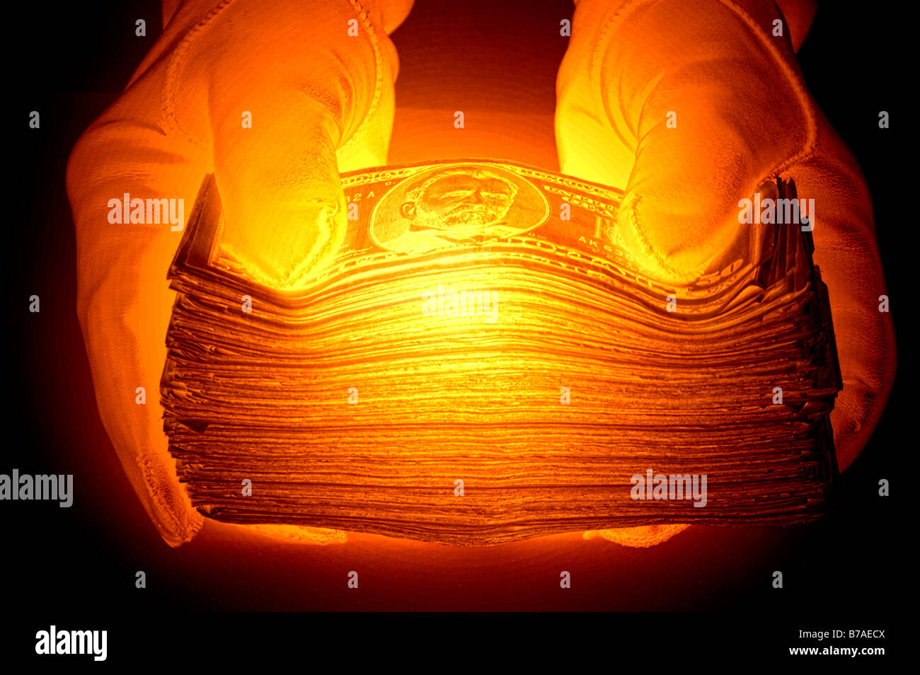 behandschuhten Hände halten einen Stapel von Vereinigten Staaten fünfzig-Dollar-Scheine Stockfoto