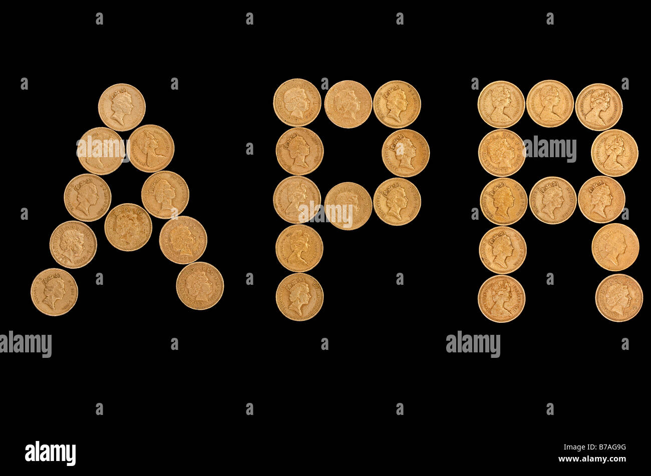 Ein bis zwei Pfund britische Münzen bilden die Buchstaben APR (effektiver Jahreszins), Großbritannien, UK, Europa Stockfoto